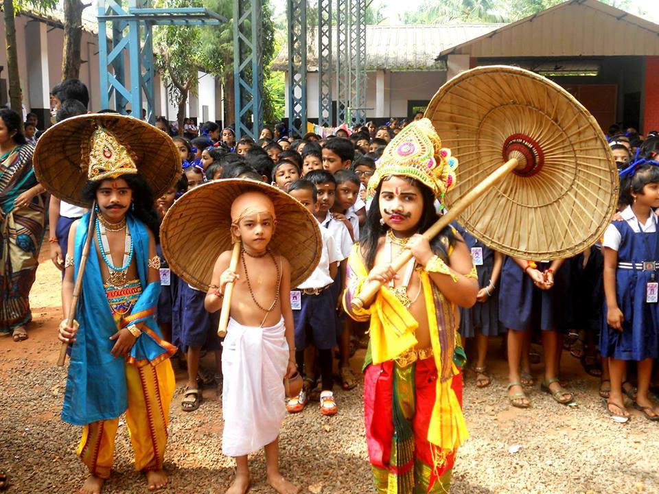 Kids playing an Act on Onam Festival (raxacollective.com)